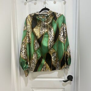 Beautiful women’s long sleeve blouse. Great for going out and or work.